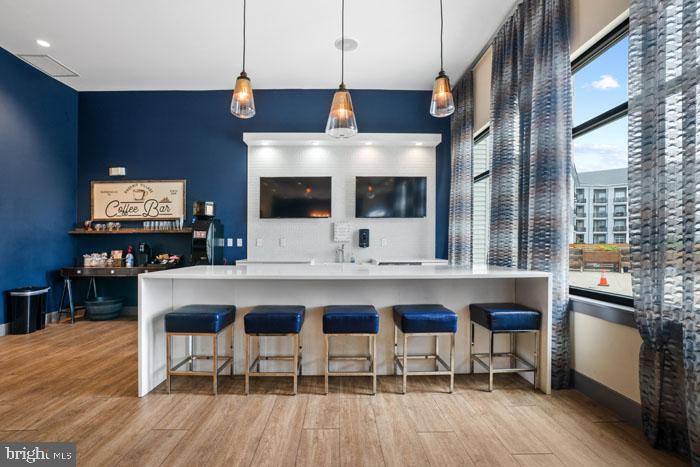 a kitchen with a sink cabinets and window