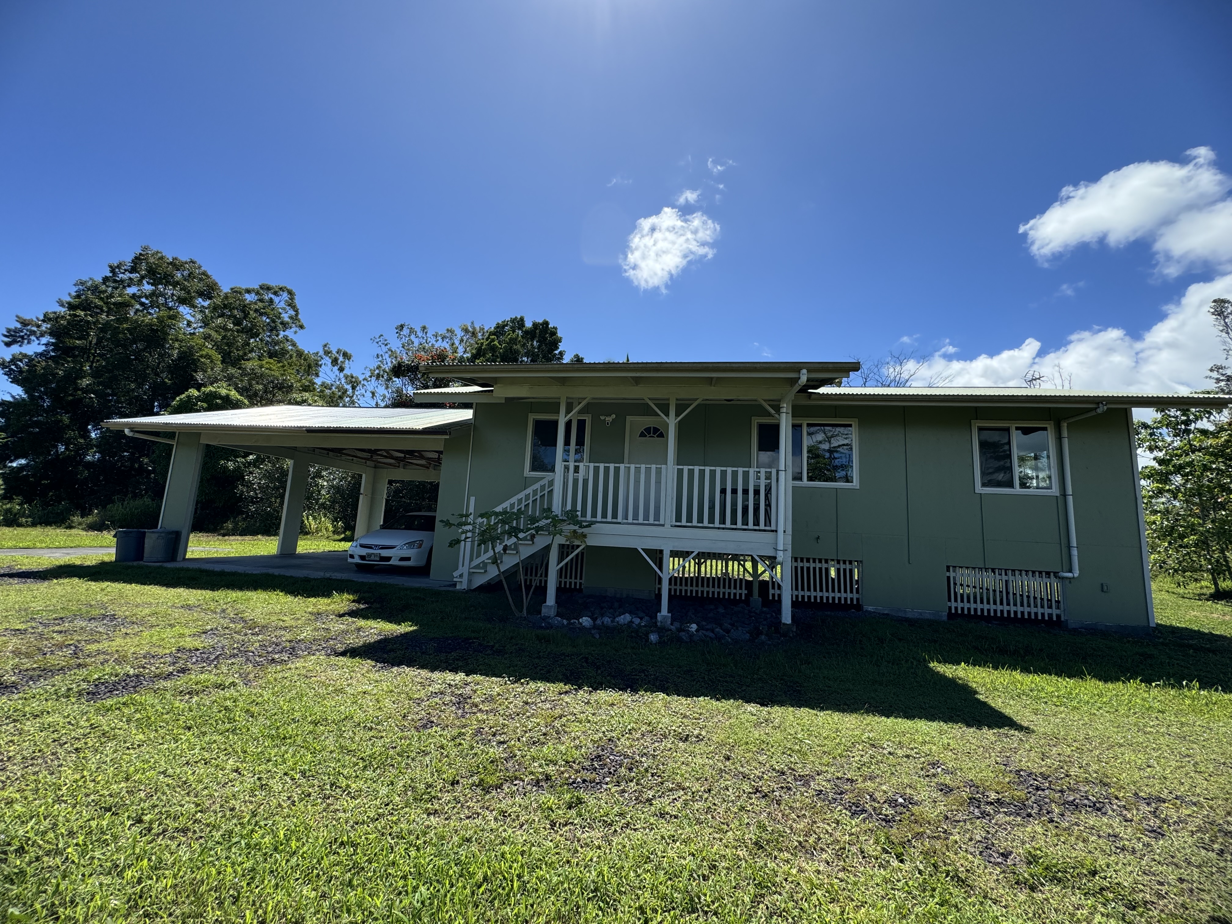 The main house has 3 bedrooms 2 baths and a huge carport.