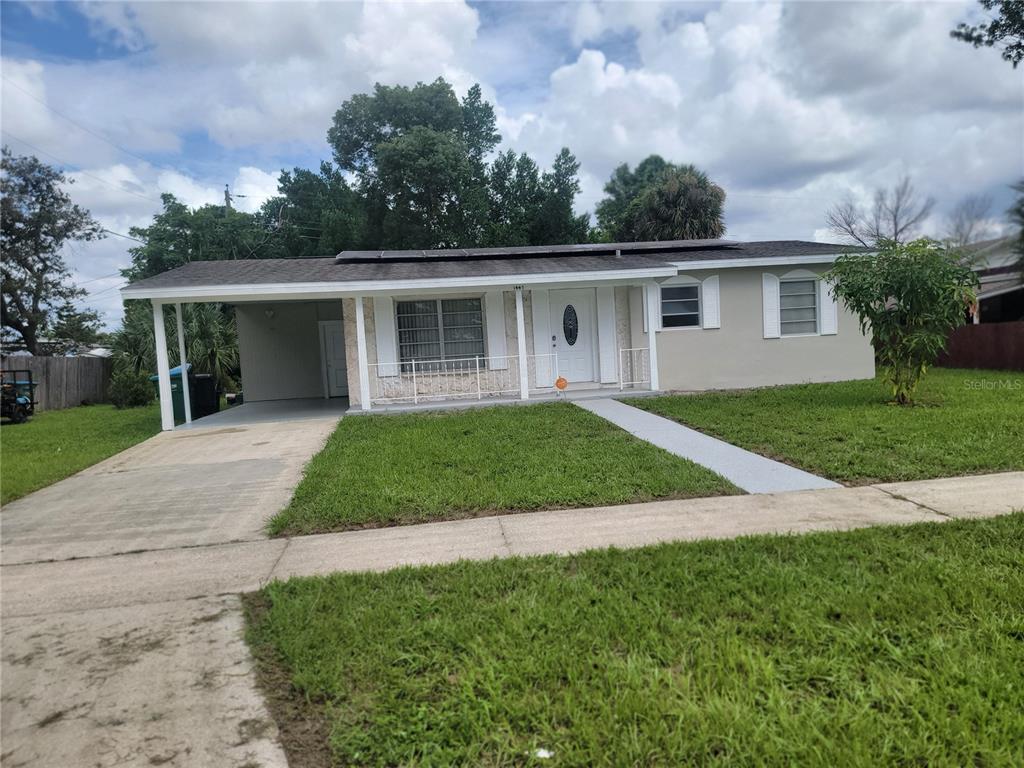 front view of a house with a yard