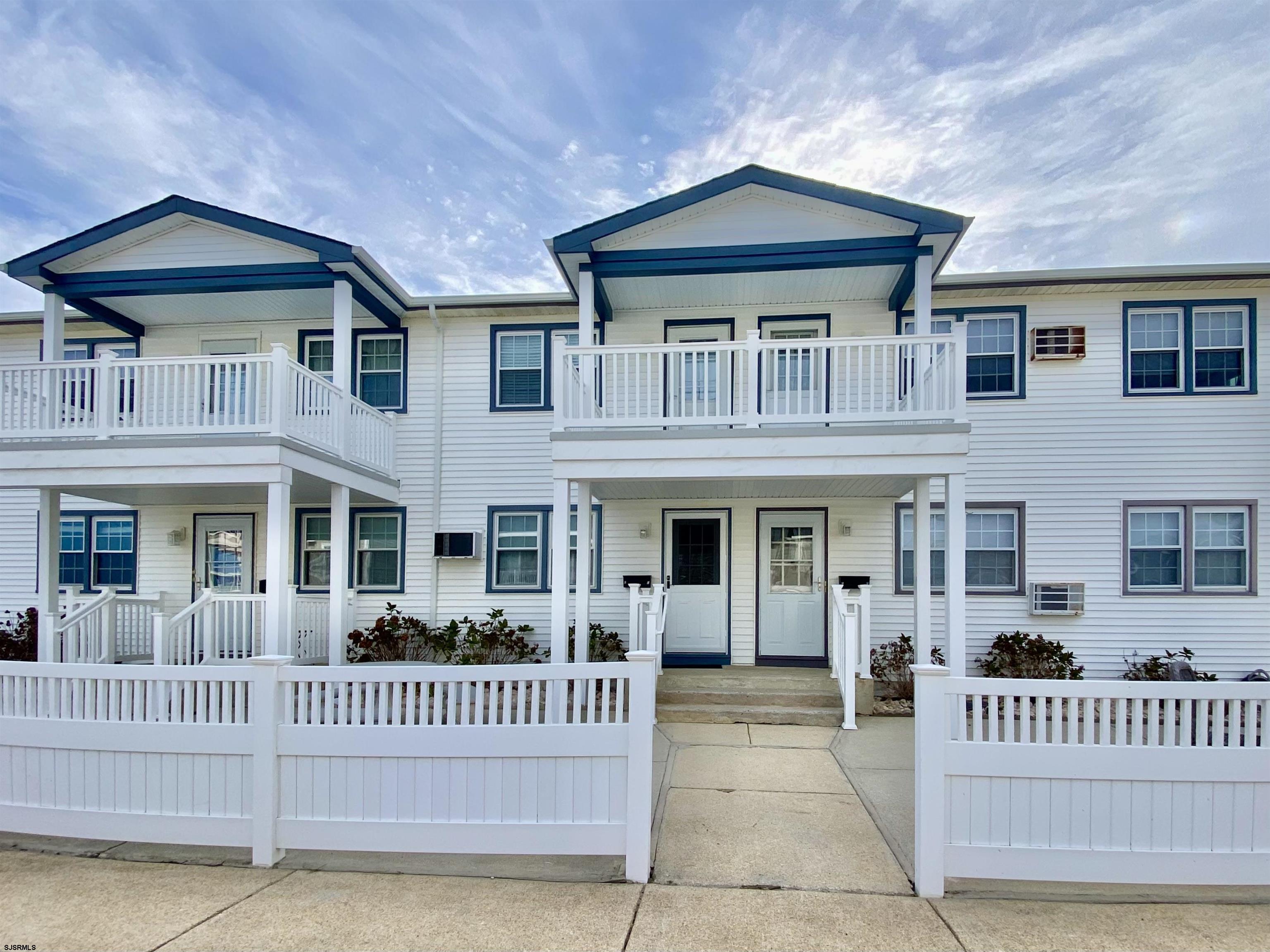 a front view of a house with a porch