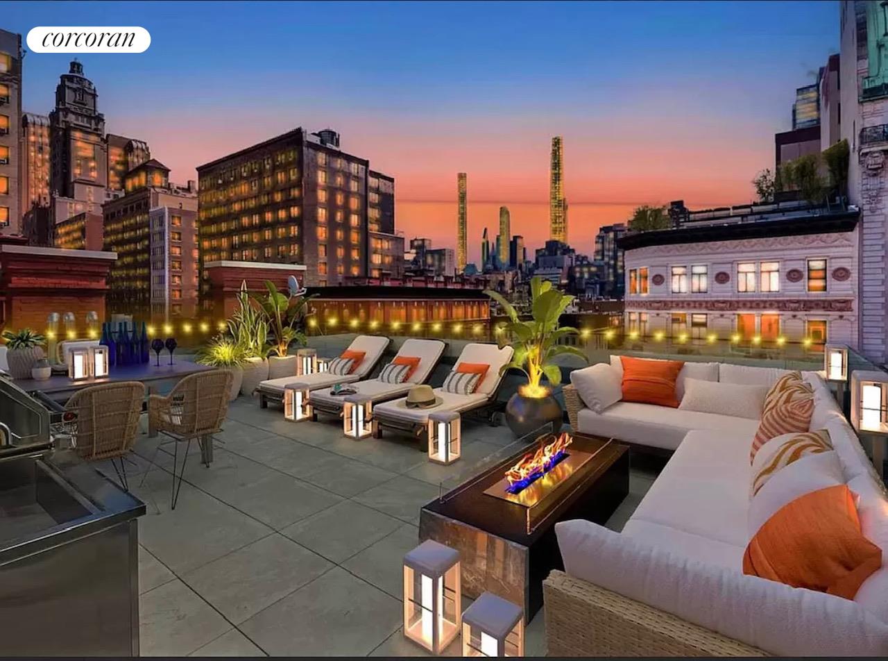 a terrace with outdoor seating and city view