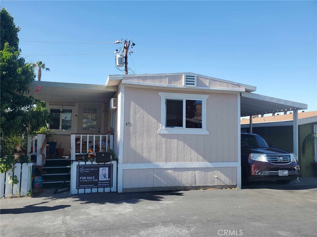 a front view of a house with parking