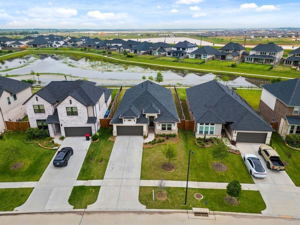 an aerial view of a house with a garden view