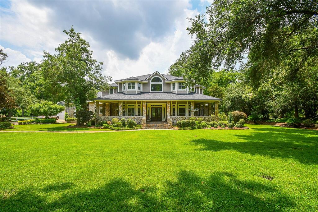 Picture yourself in this stunning custom-built home, surrounded by the beauty of nature on a spacious 2.24-acre lot. Imagine waking up to the tranquil sounds of a babbling creek, shaded by majestic pecan and oak trees casting dappled sunlight on the property.