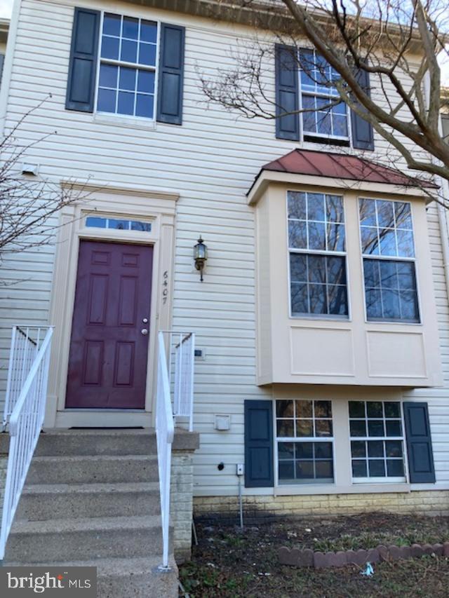 a front view of a house with a window