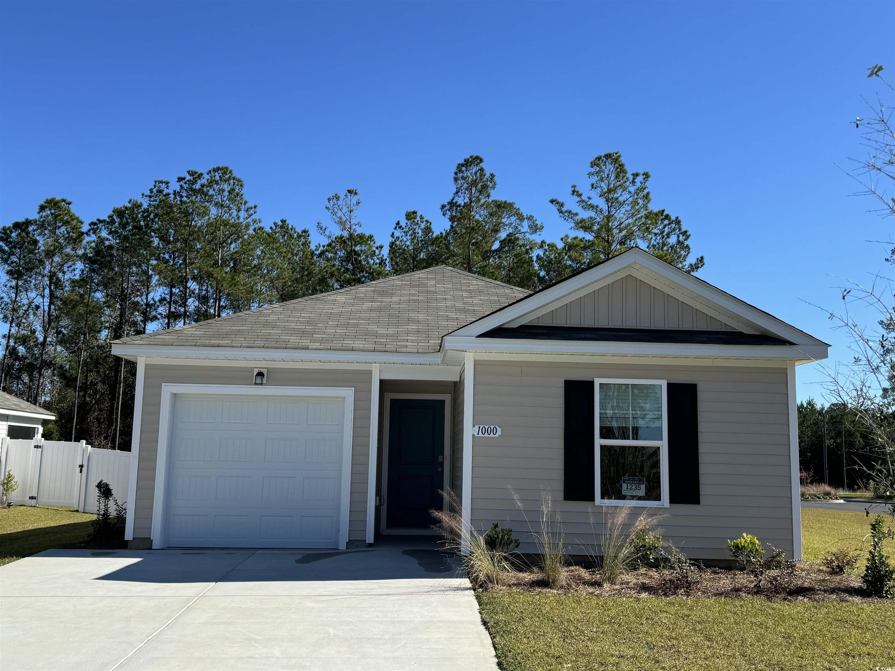 Single story home with a garage