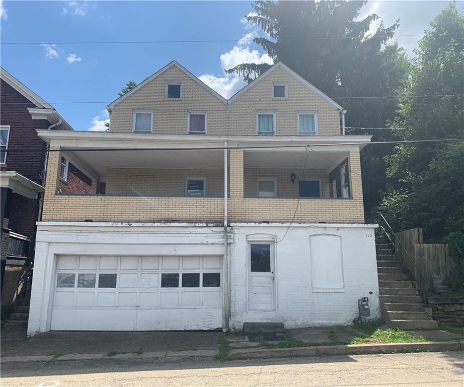 a view of a house with a balcony