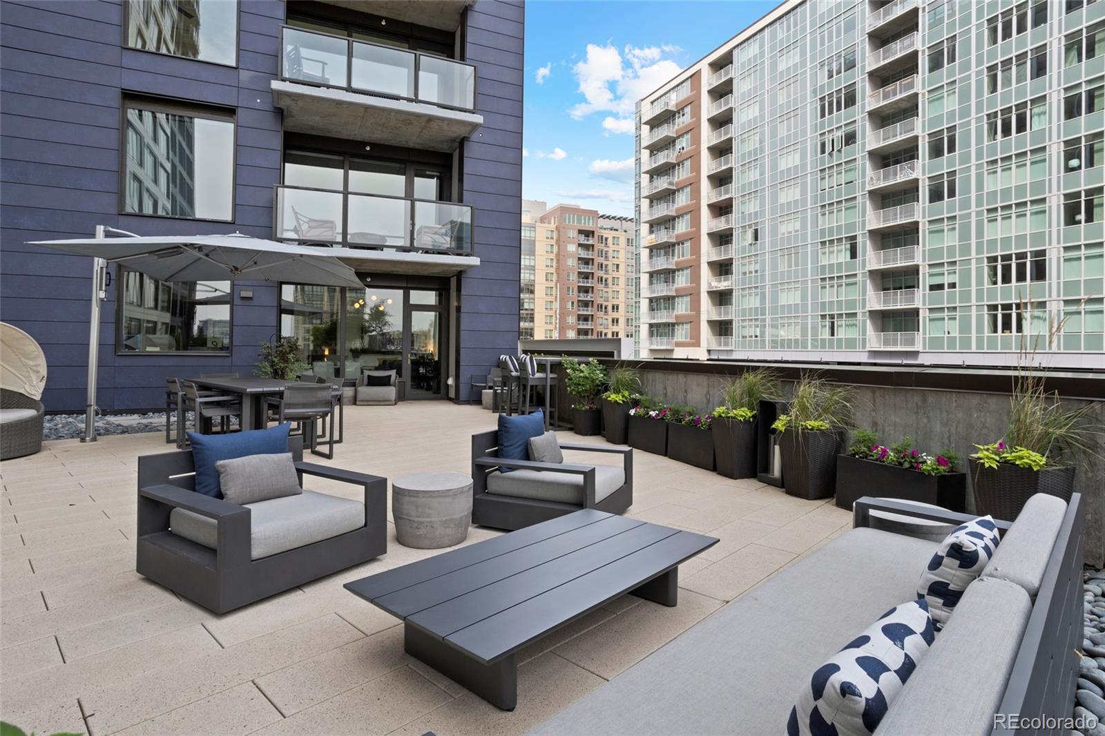 a building outdoor space with patio furniture