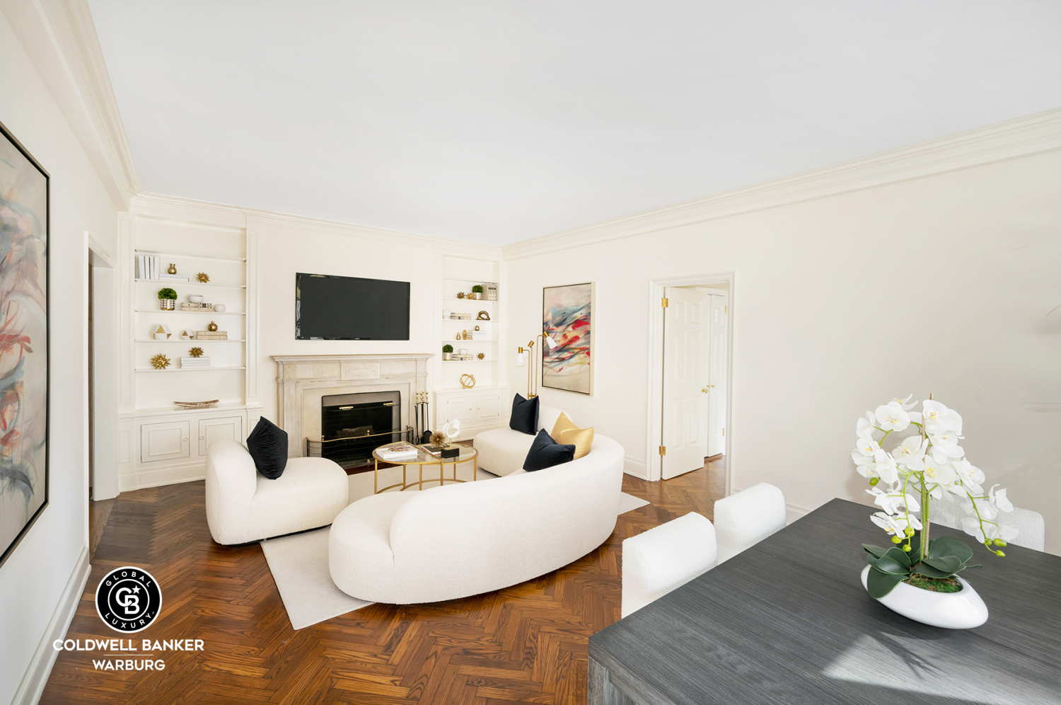 a living room with furniture a fireplace and a flat screen tv