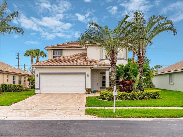 $630,000 | 8254 Palm Gate Drive