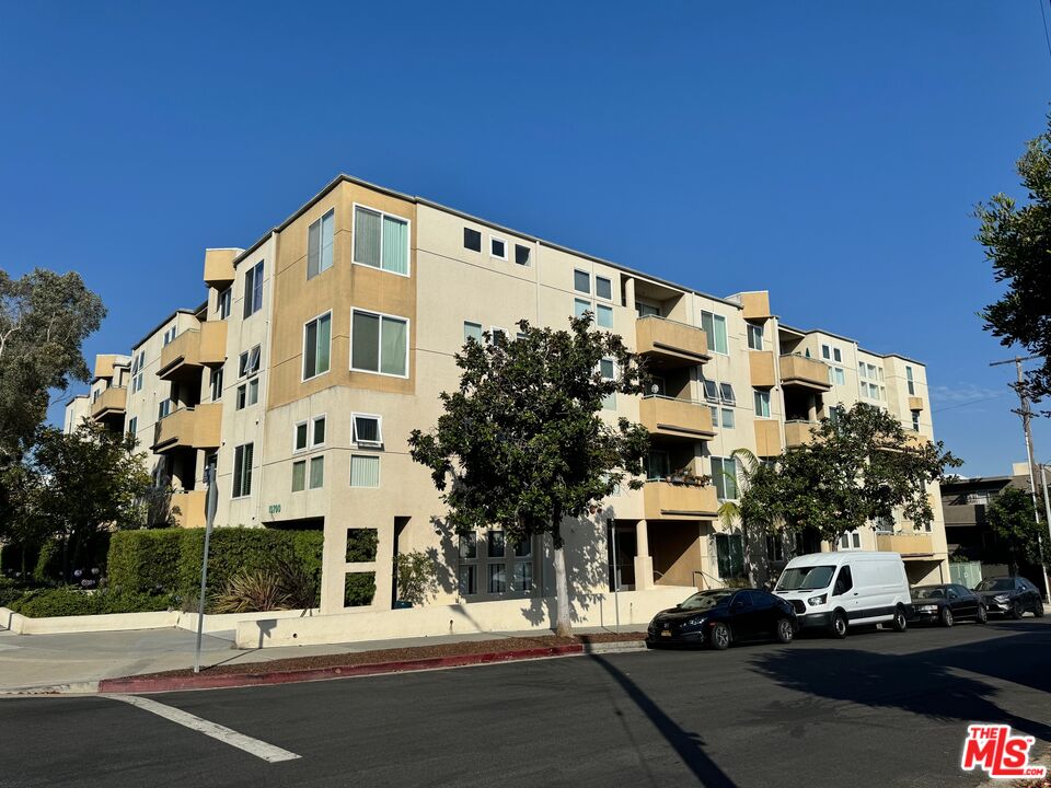 a front view of a building with street view