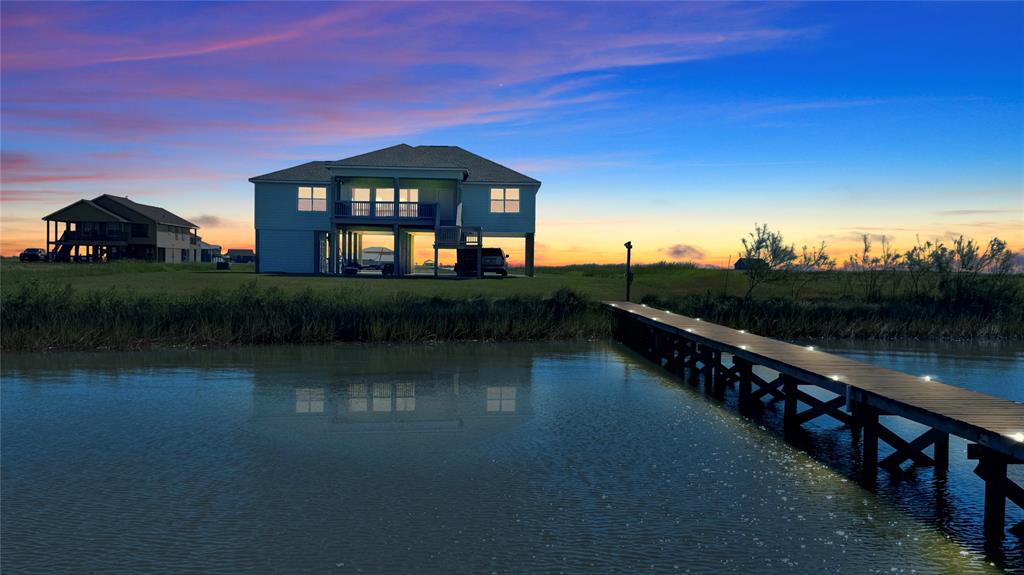 a view of a lake in front of house