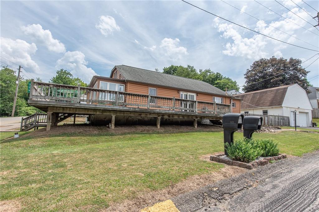 a view of a house with roof deck