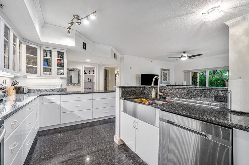 a kitchen with counter top space and a sink