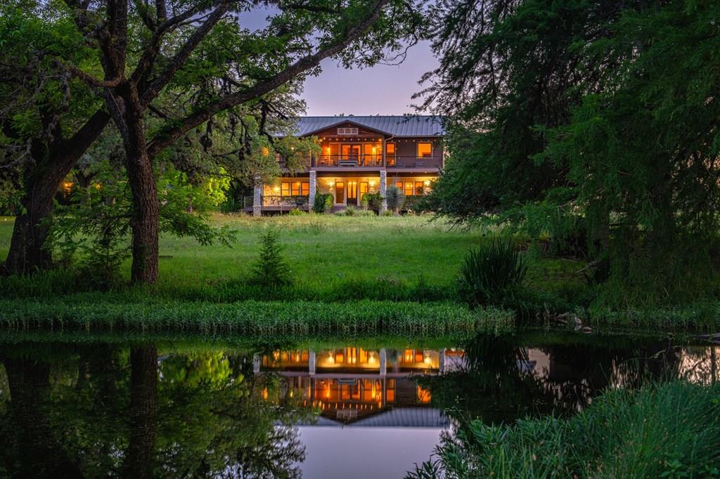 a view of a lake and a yard