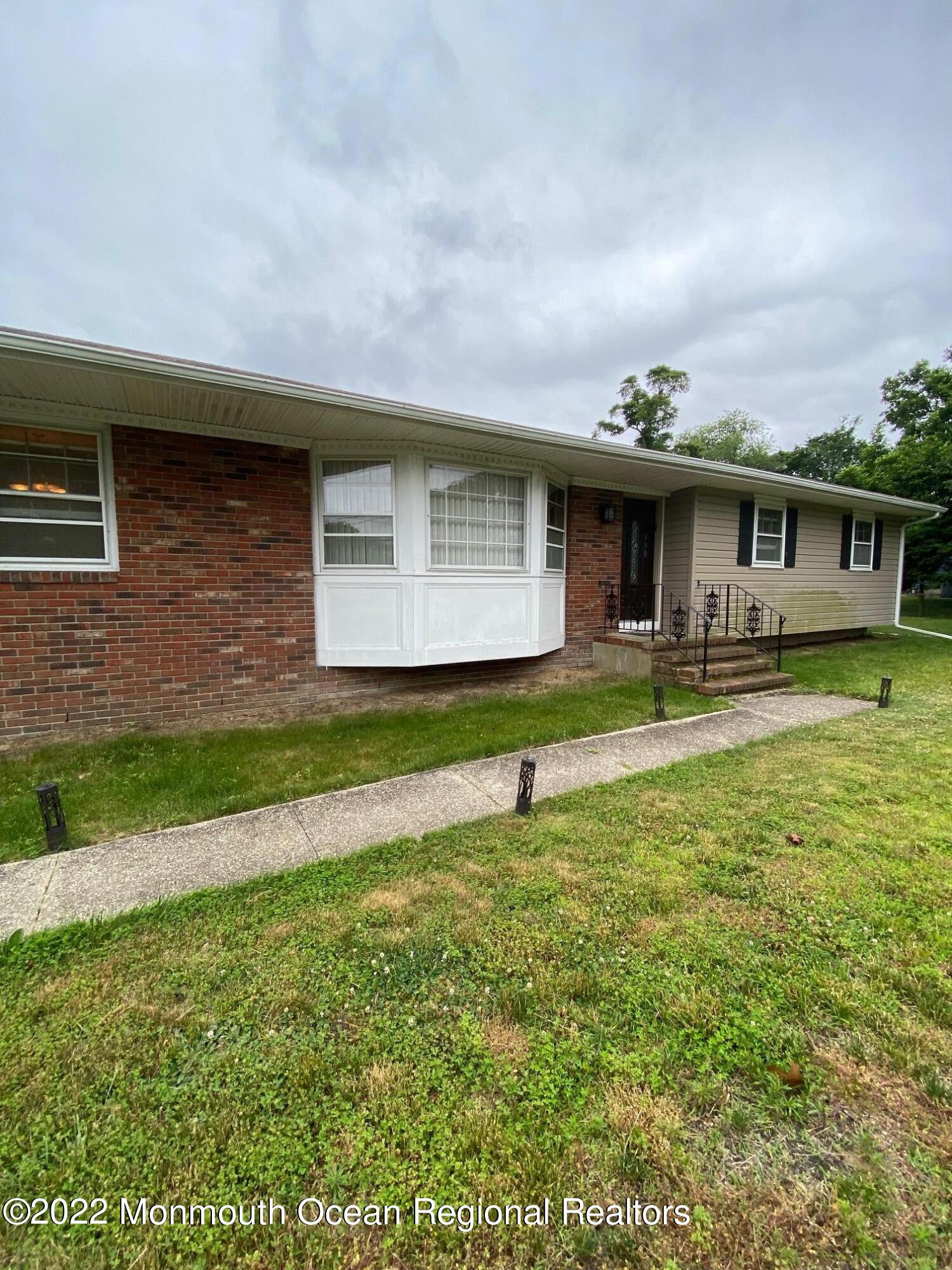 a front view of house with yard