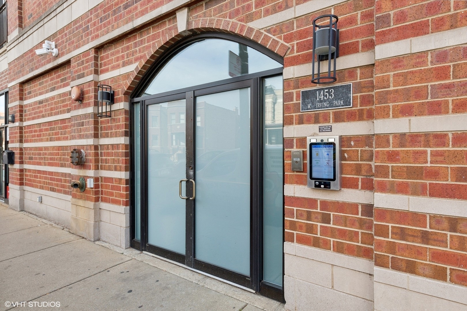 a view of a brick building with a shower