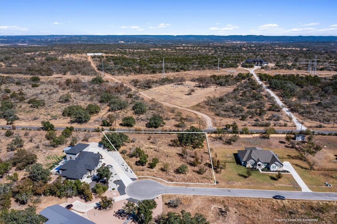 an aerial view of residential building with ocean view