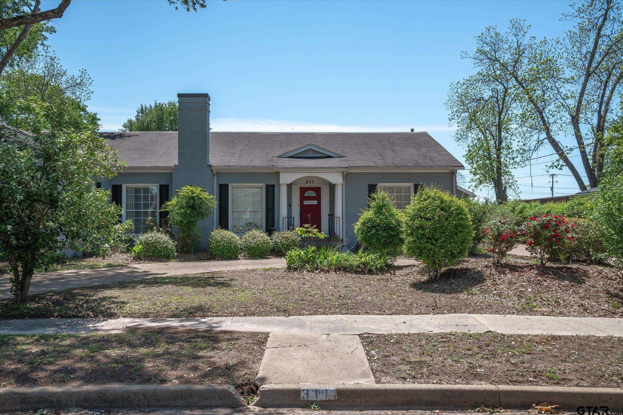 a front view of house with yard