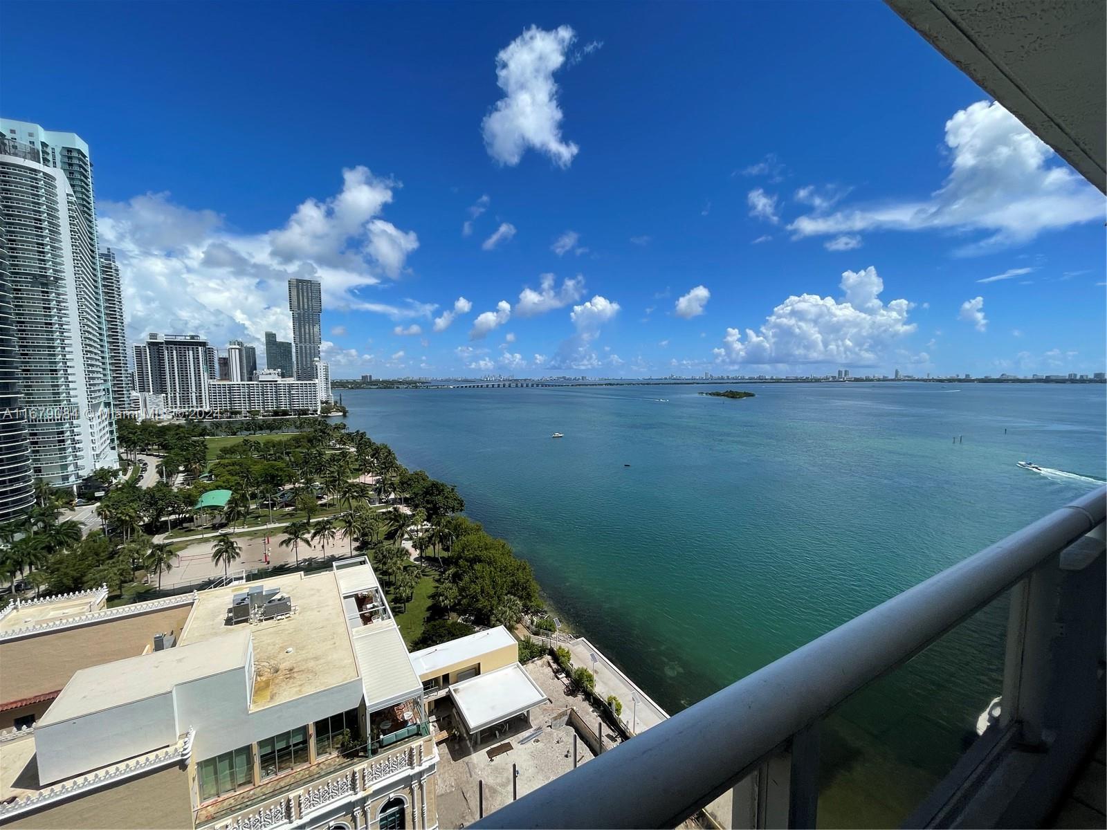 a view of a balcony with lake view