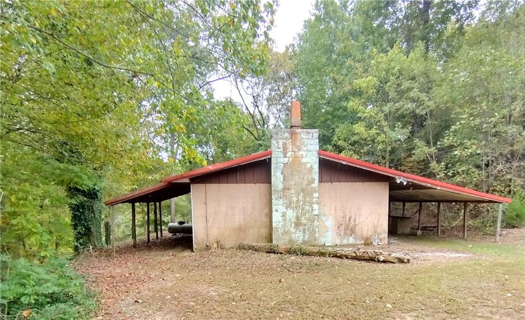 a house with trees in the background