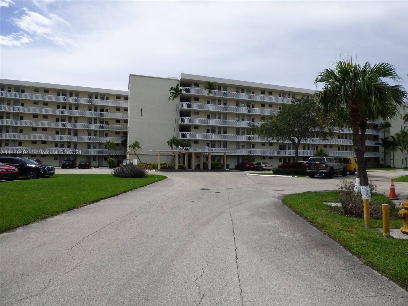 a view of building with yard