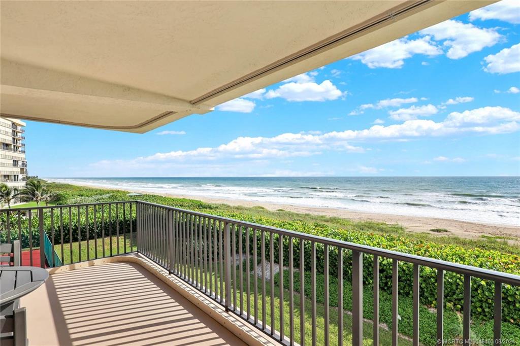 a view of balcony with ocean view