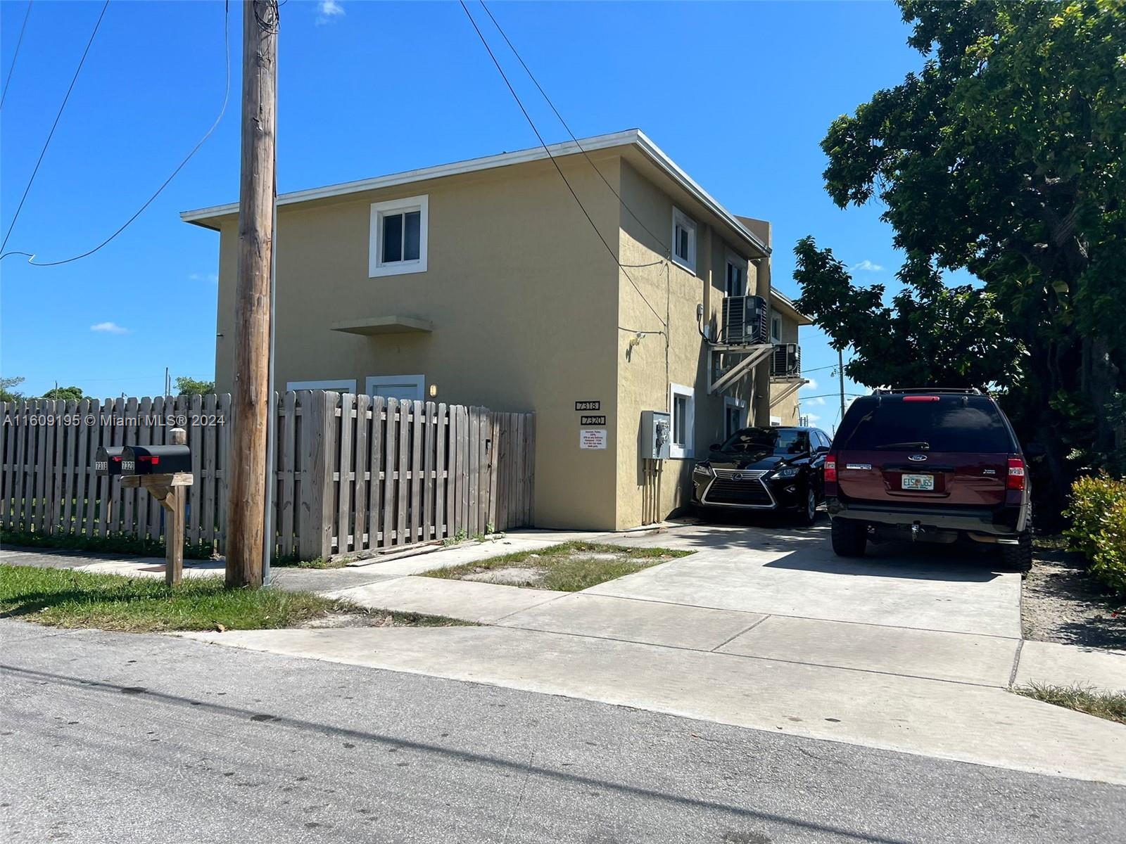 a car parked in front of a house