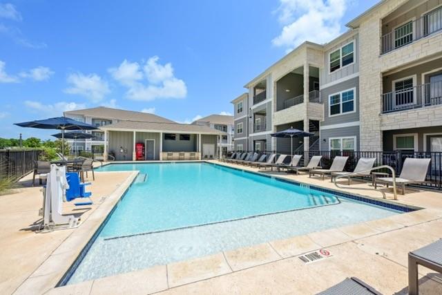 a view of a building with a swimming pool