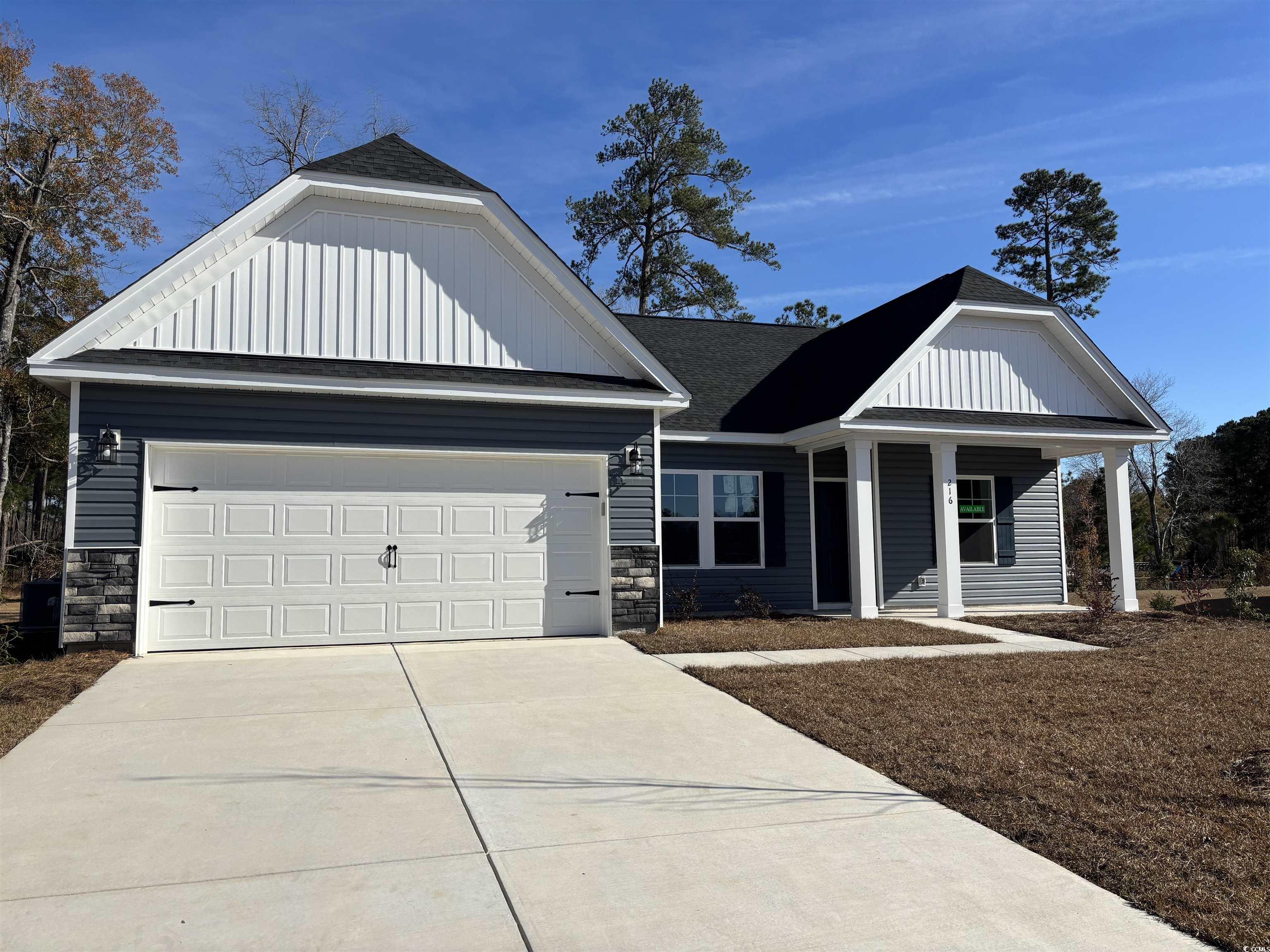 View of front facade with a garage