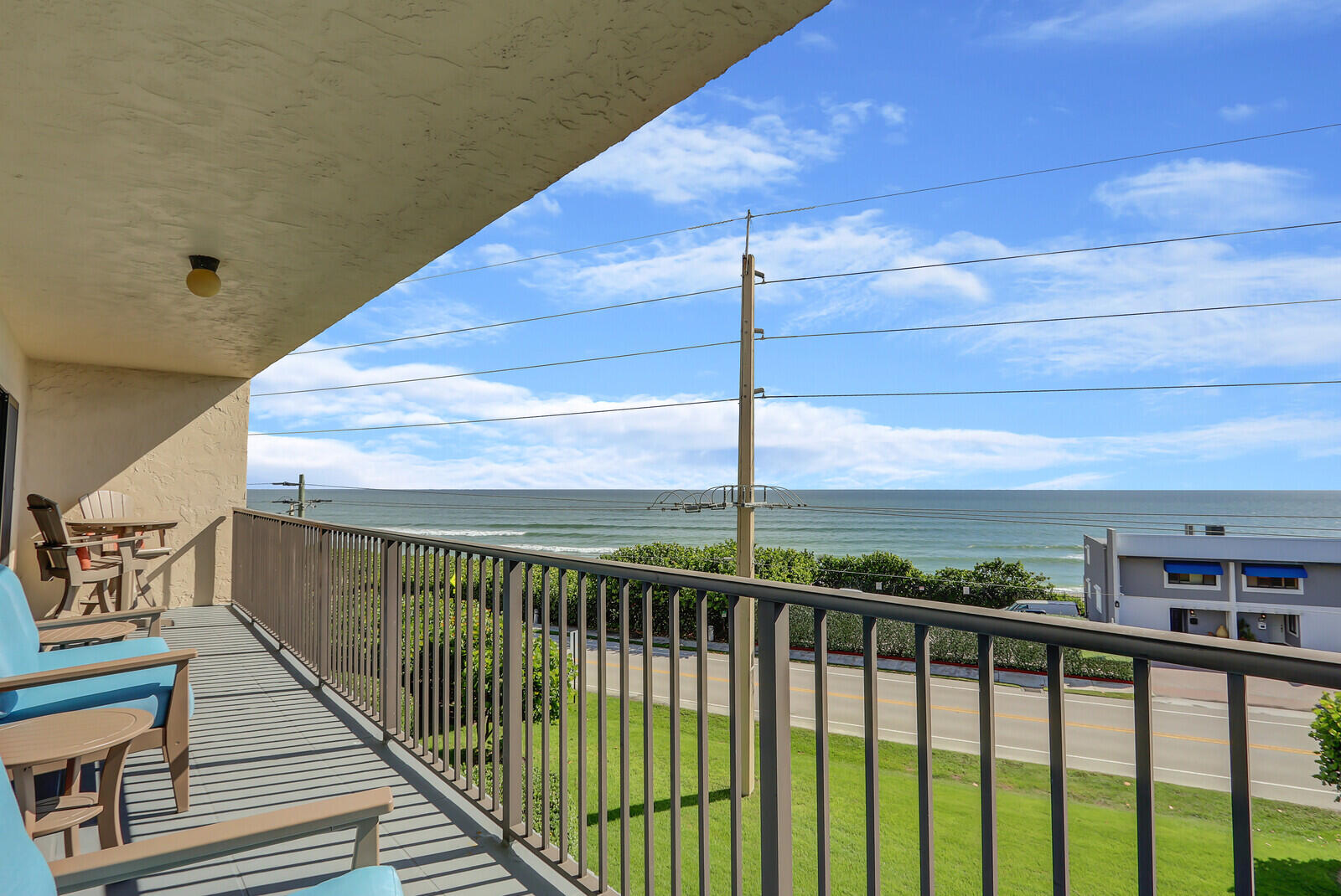 a view of balcony with furniture