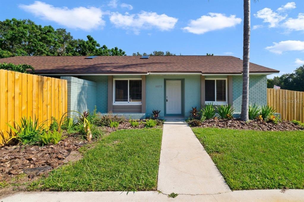 Excellent investment or first home opportunity in East Orlando’s Riverwood community! This 3BD/2BA half duplex has been COMPLETELY RENOVATED including FRESH PAINT INSIDE & OUT and the spacious yard is fenced for added privacy! 