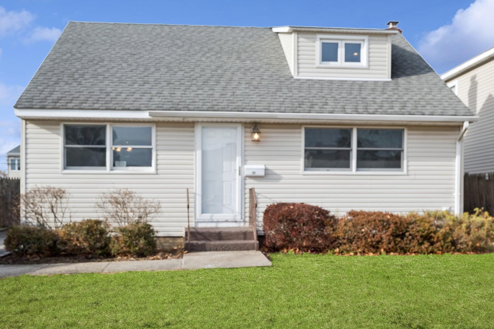 View of front of home with a front lawn