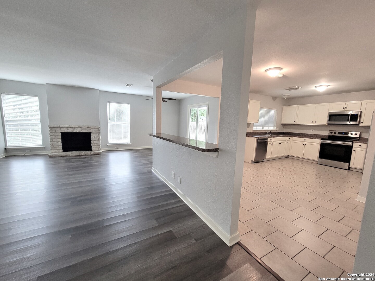 a large kitchen with cabinets