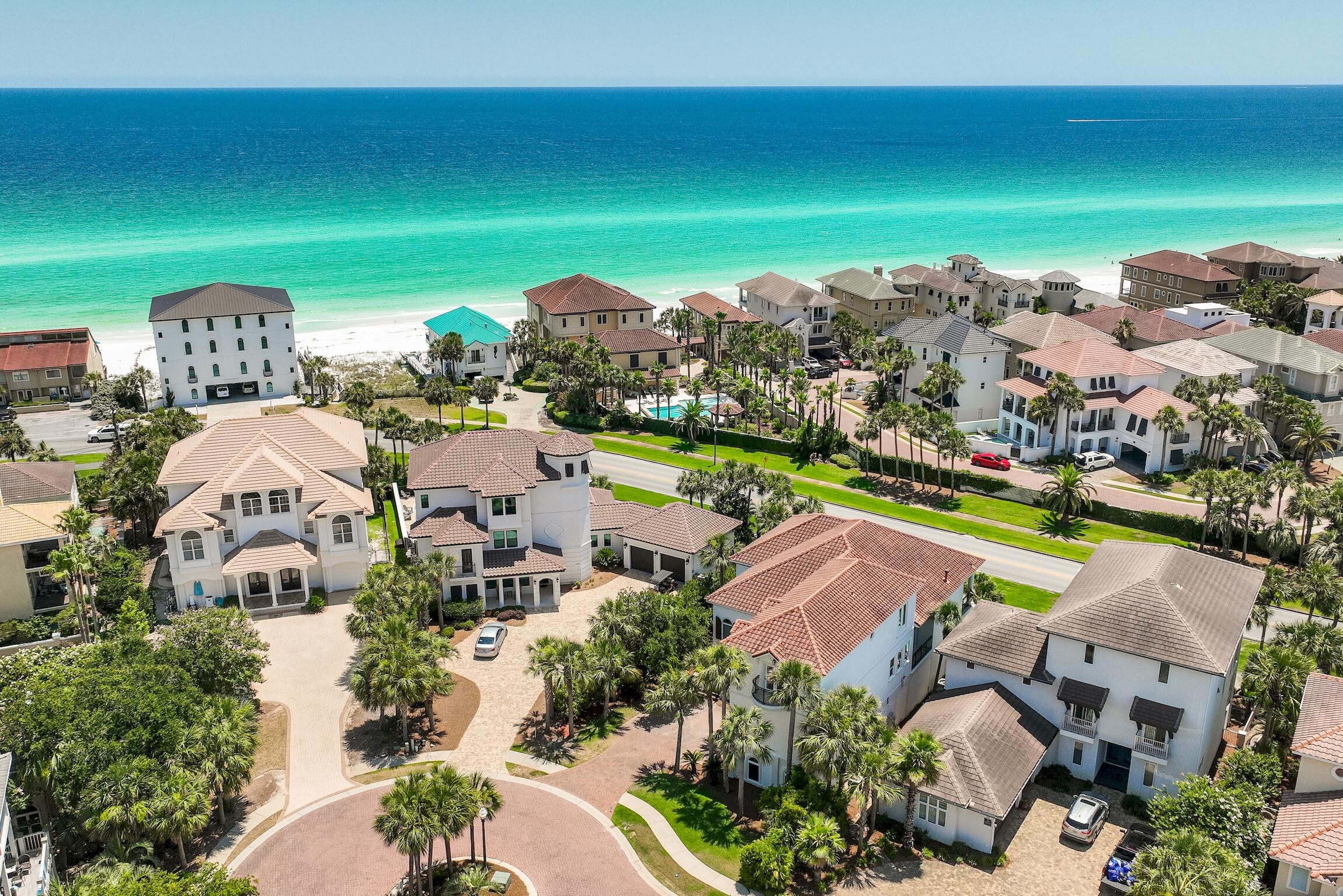 an aerial view of a house with outdoor space pool ocean view