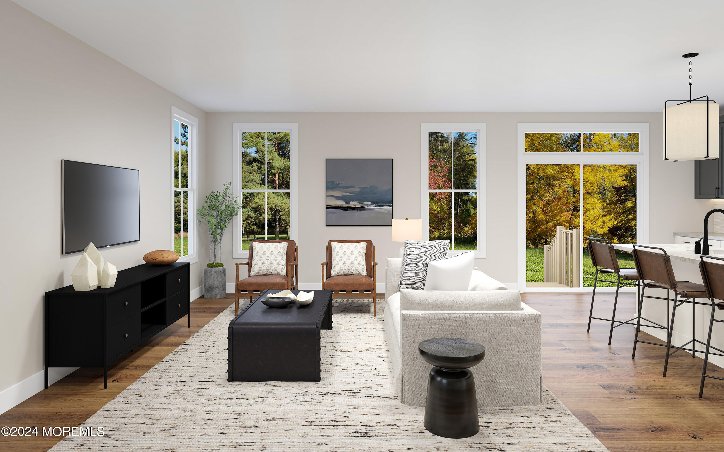 a living room with furniture and a flat screen tv