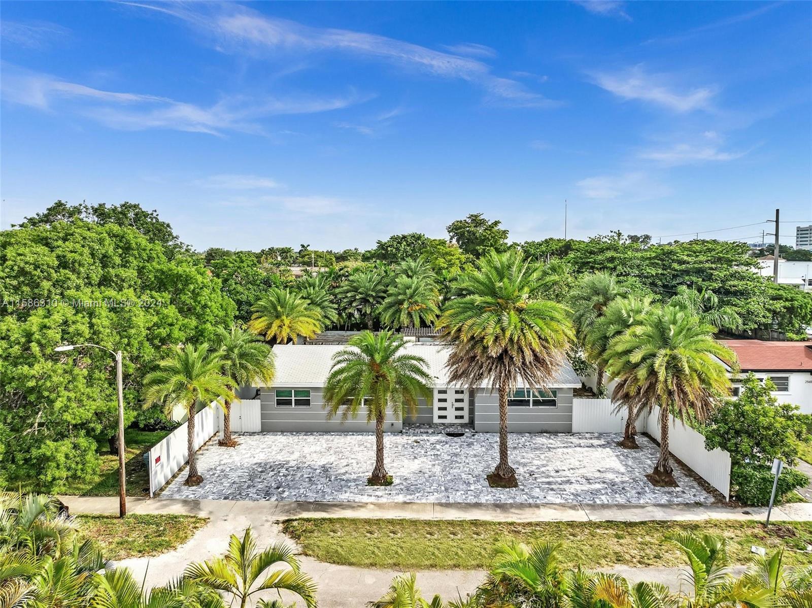 a view of outdoor space with swimming pool and trees