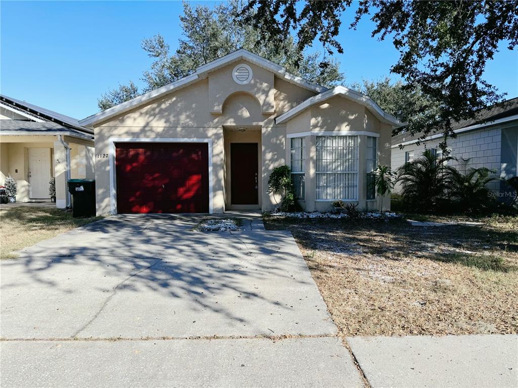 a front view of house with yard