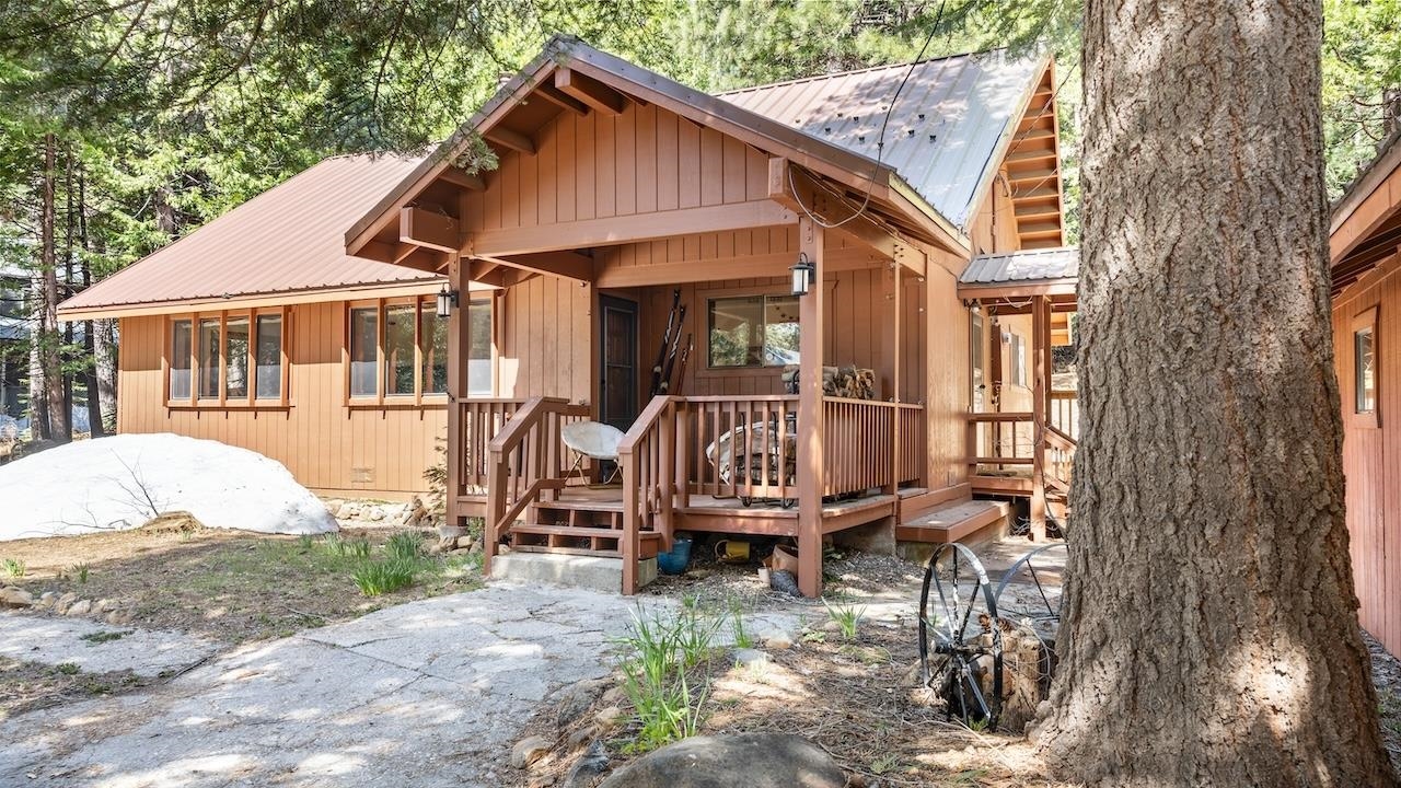 a small house with table and chairs