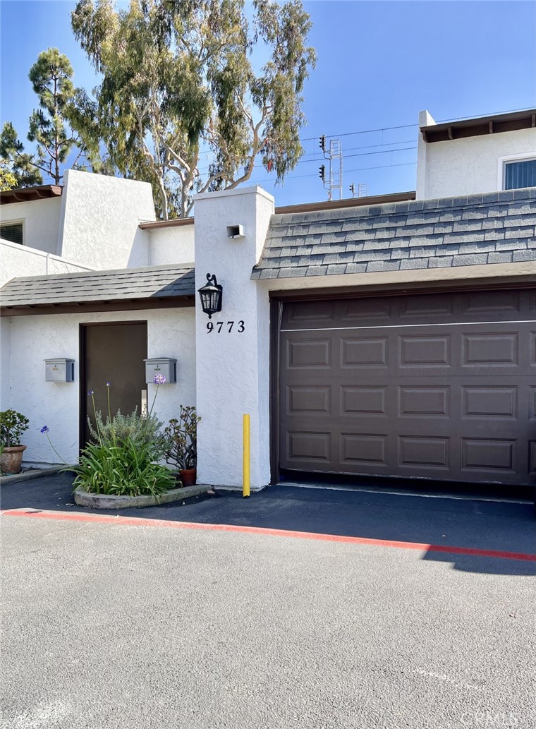 a view of a house with a garage