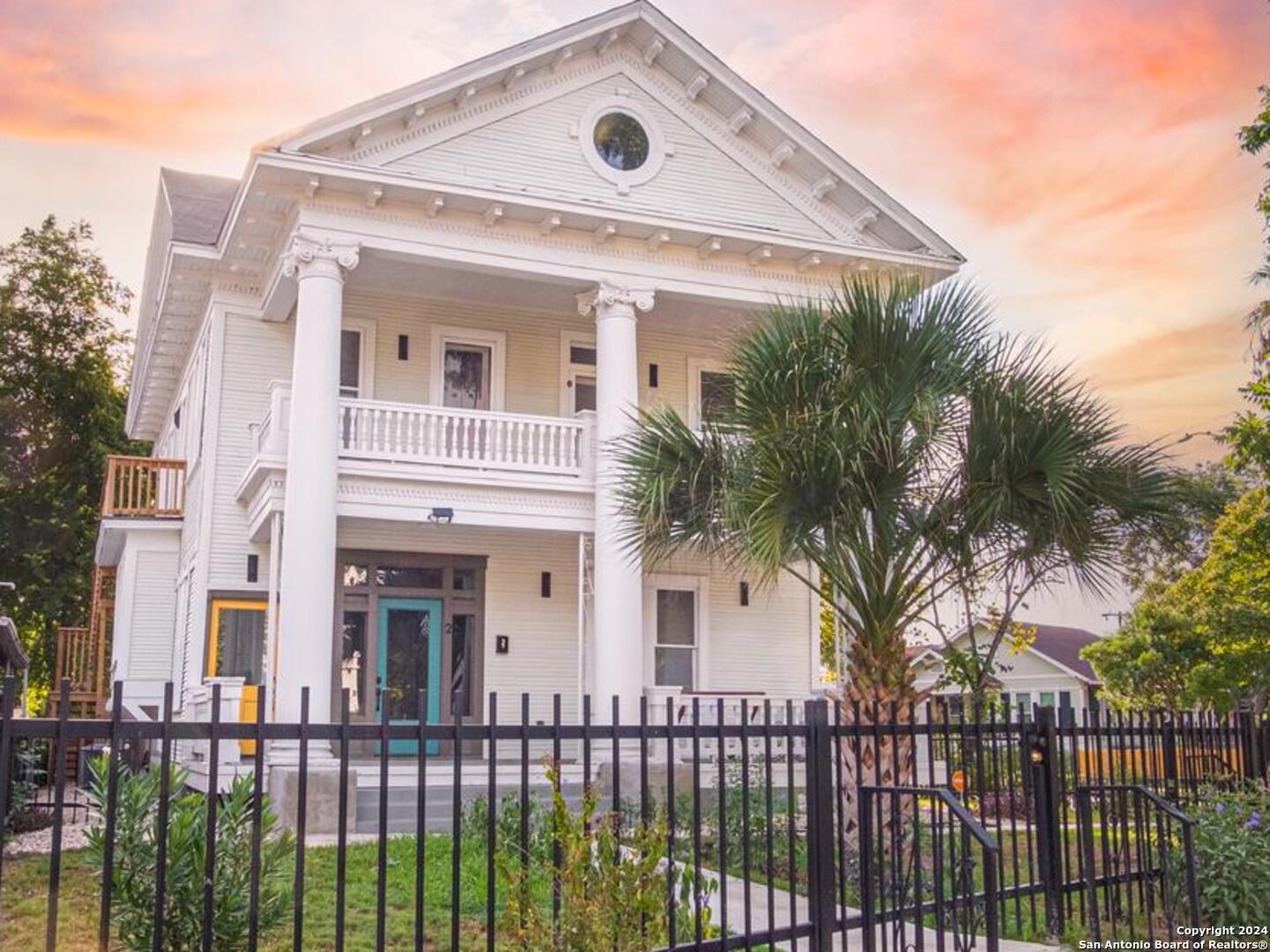 a front view of a house with a balcony