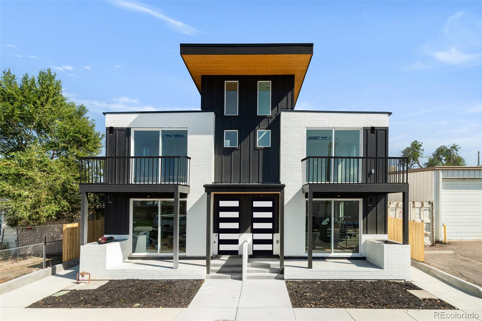 a front view of a building with a entryway