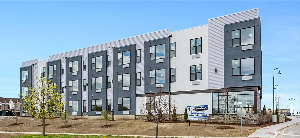 a front view of a building with street view