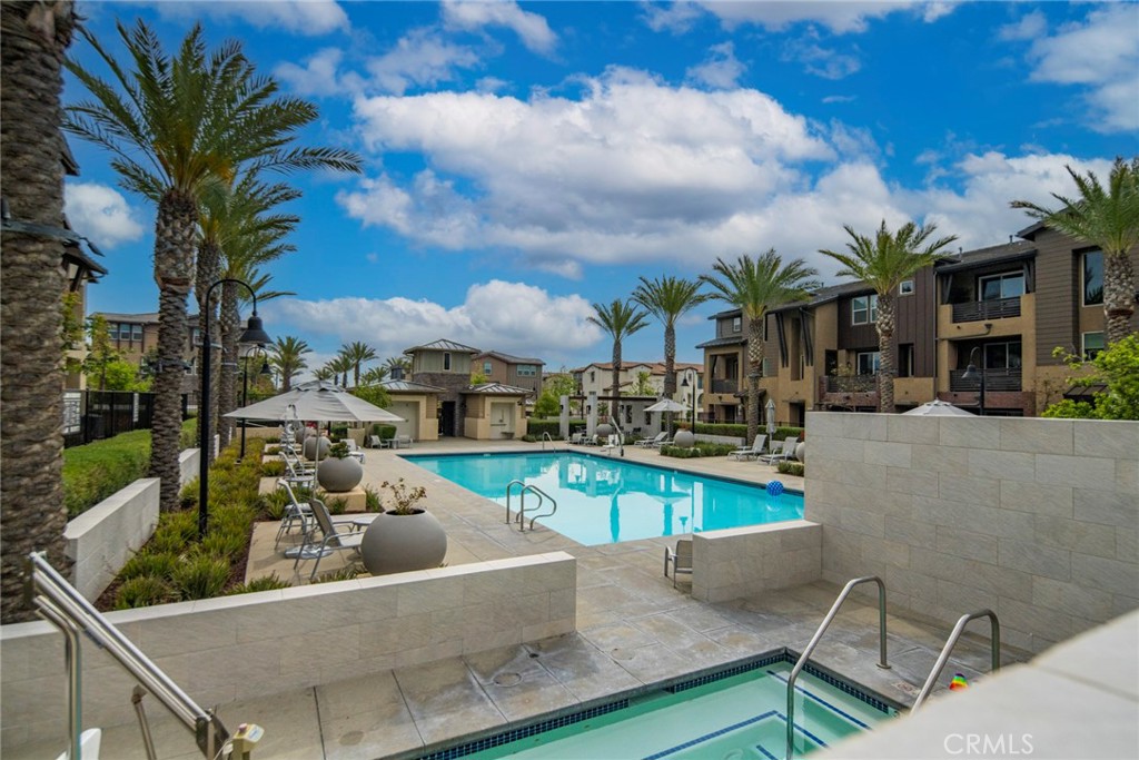 a view of a patio with swimming pool