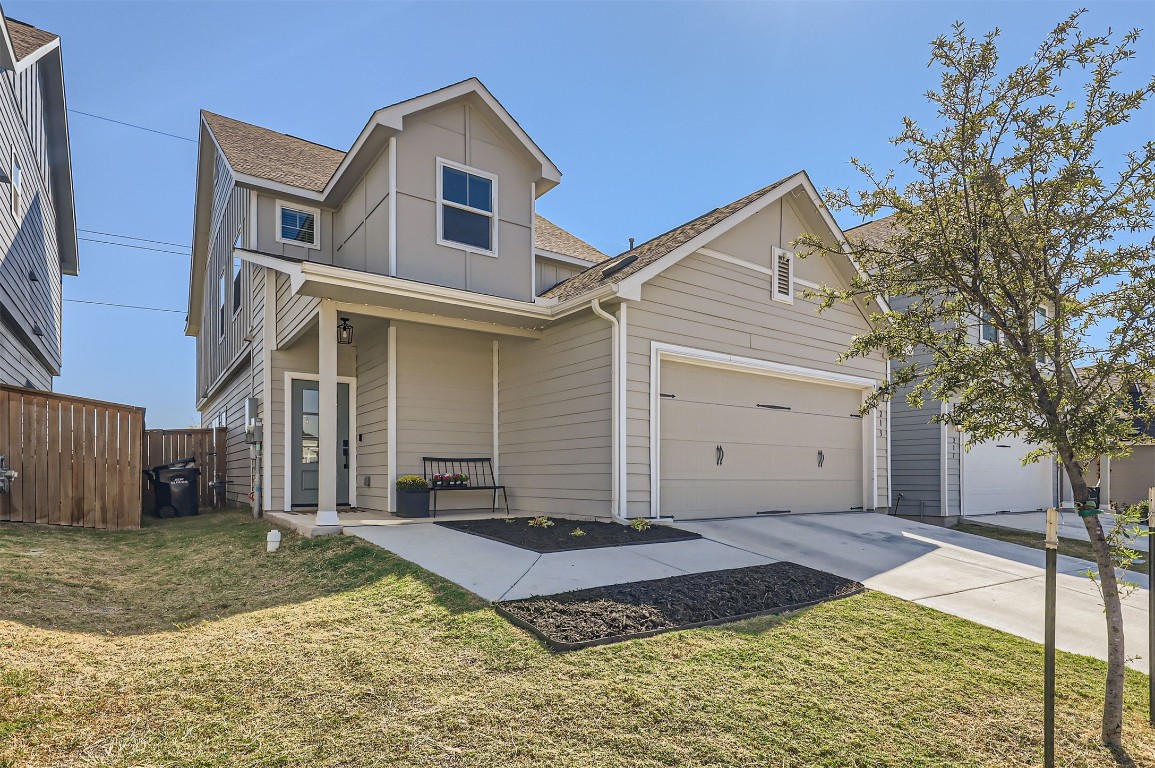 a front view of a house with a yard