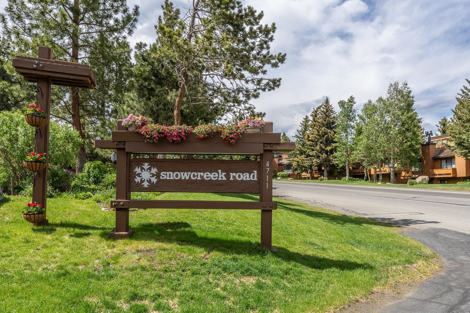 a view of a park with welcome board