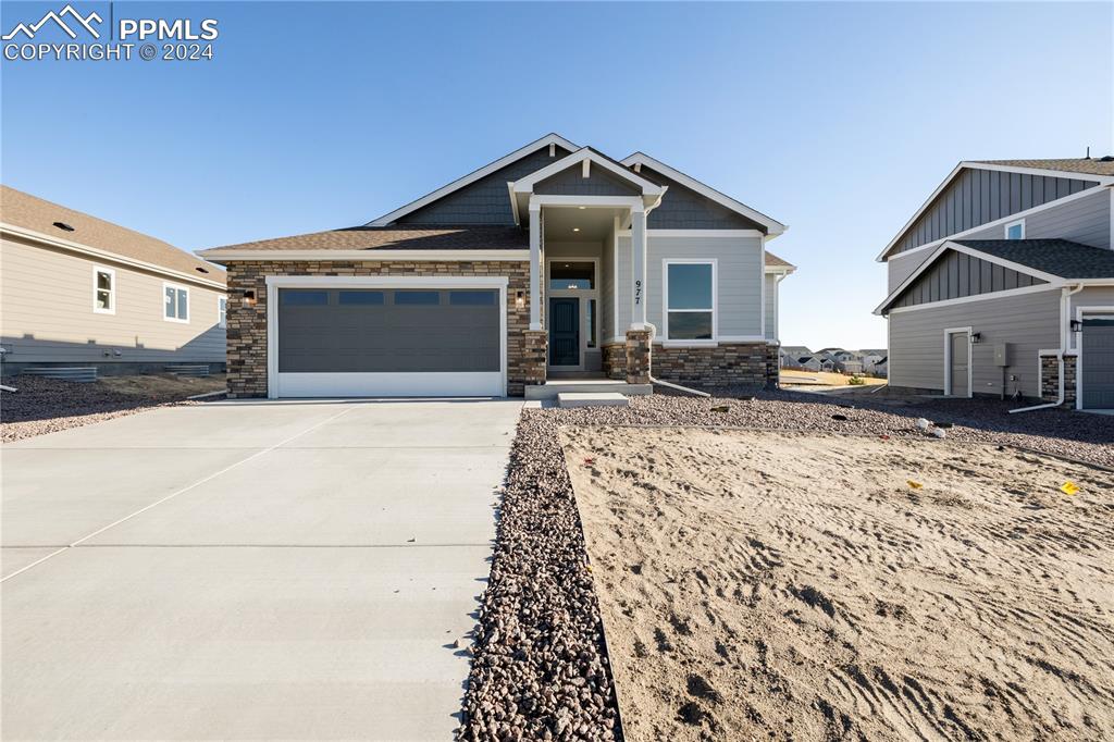 View of front facade with a garage