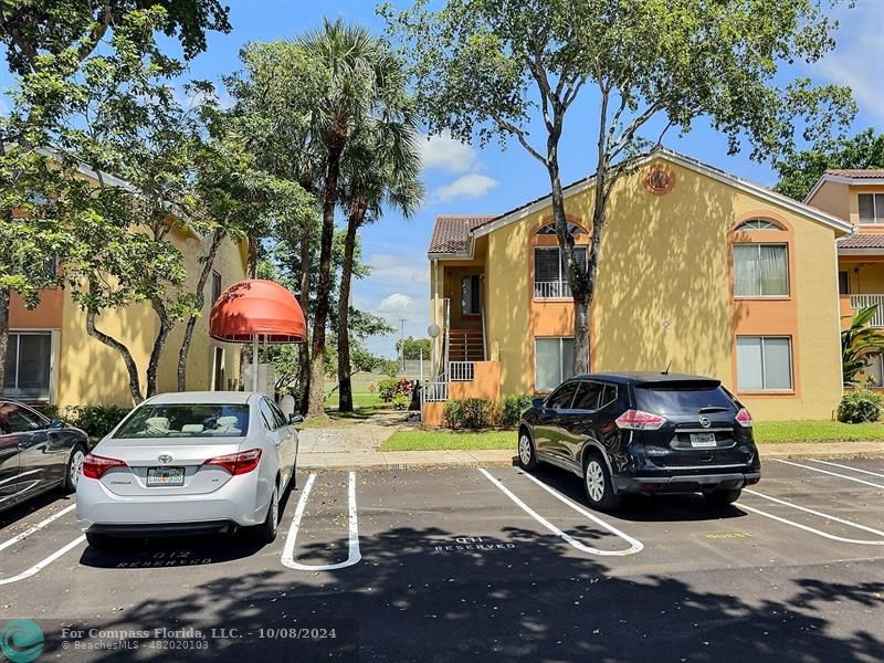 a car parked in front of a house