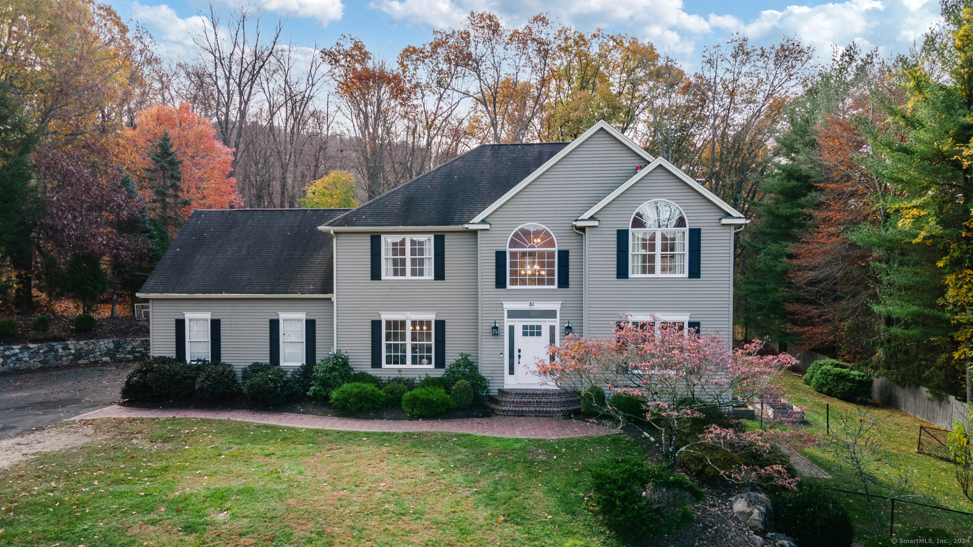 a house view with a garden space