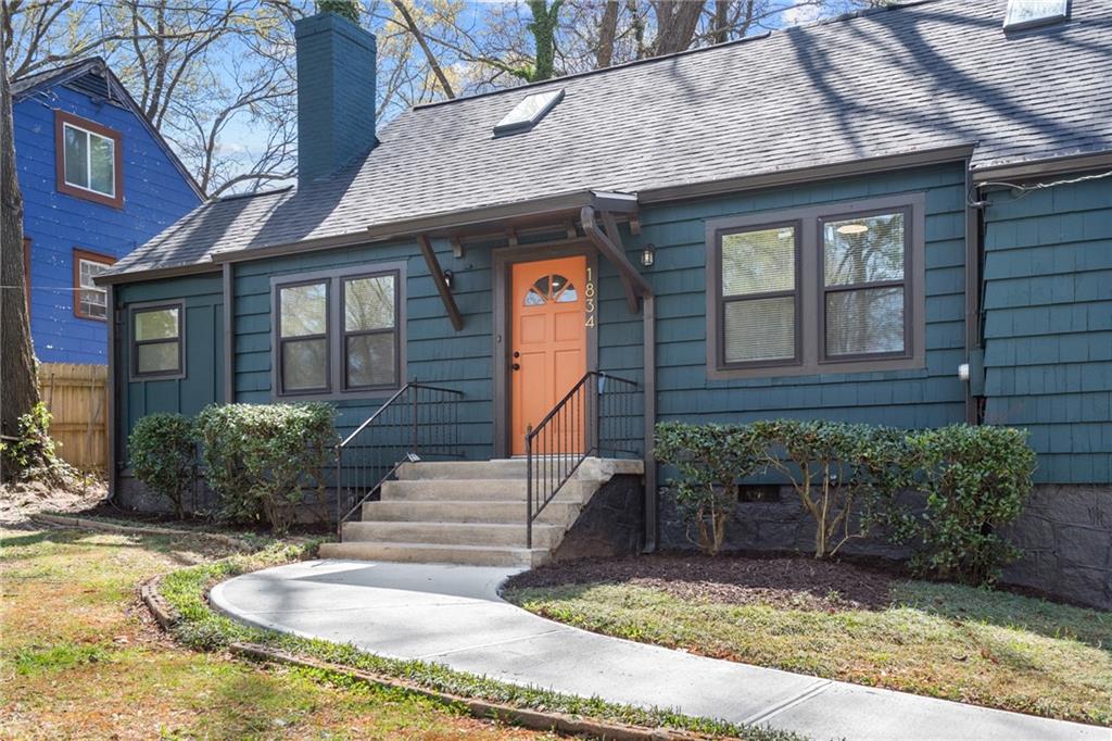 a front view of a house with entertaining space